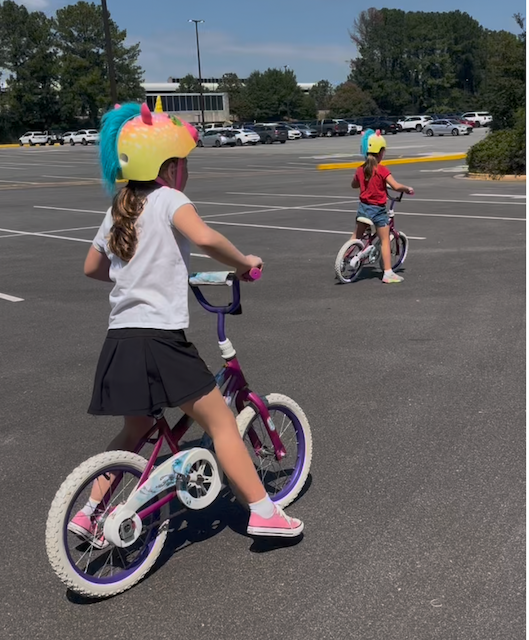 balancing on a pedal bike , take off pedals no need to add training wheels, or buy a big balance bike if your child is older than 4